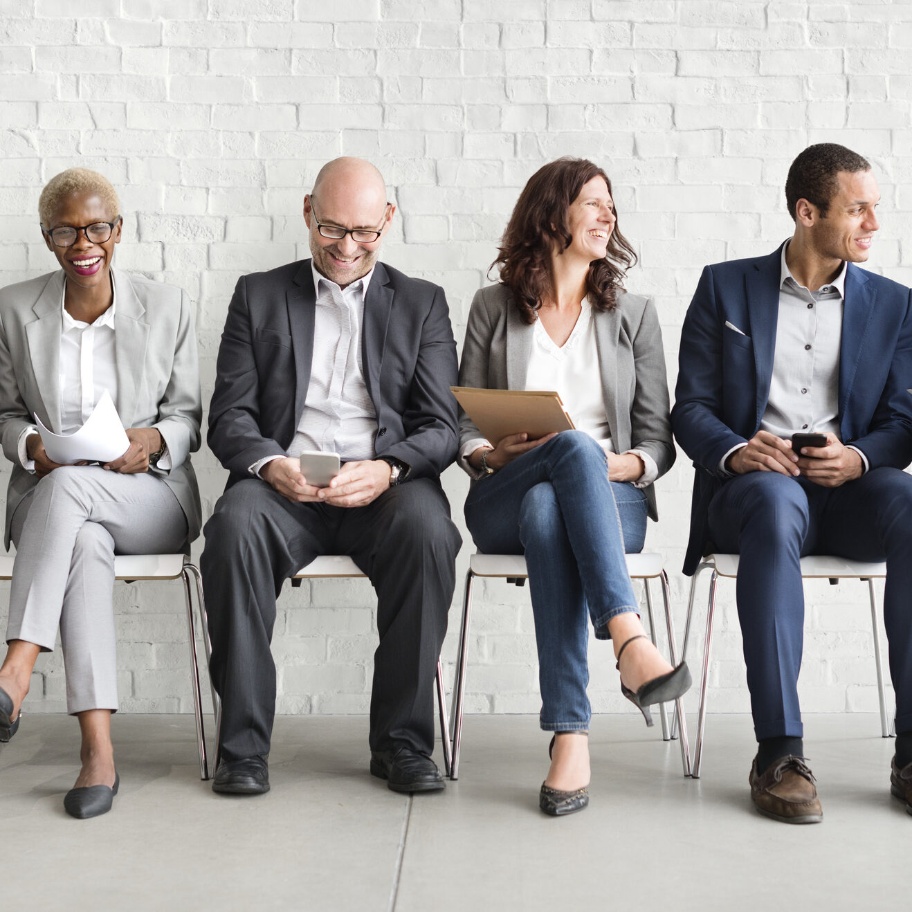 Group of diverse people are waiting for a job interview
